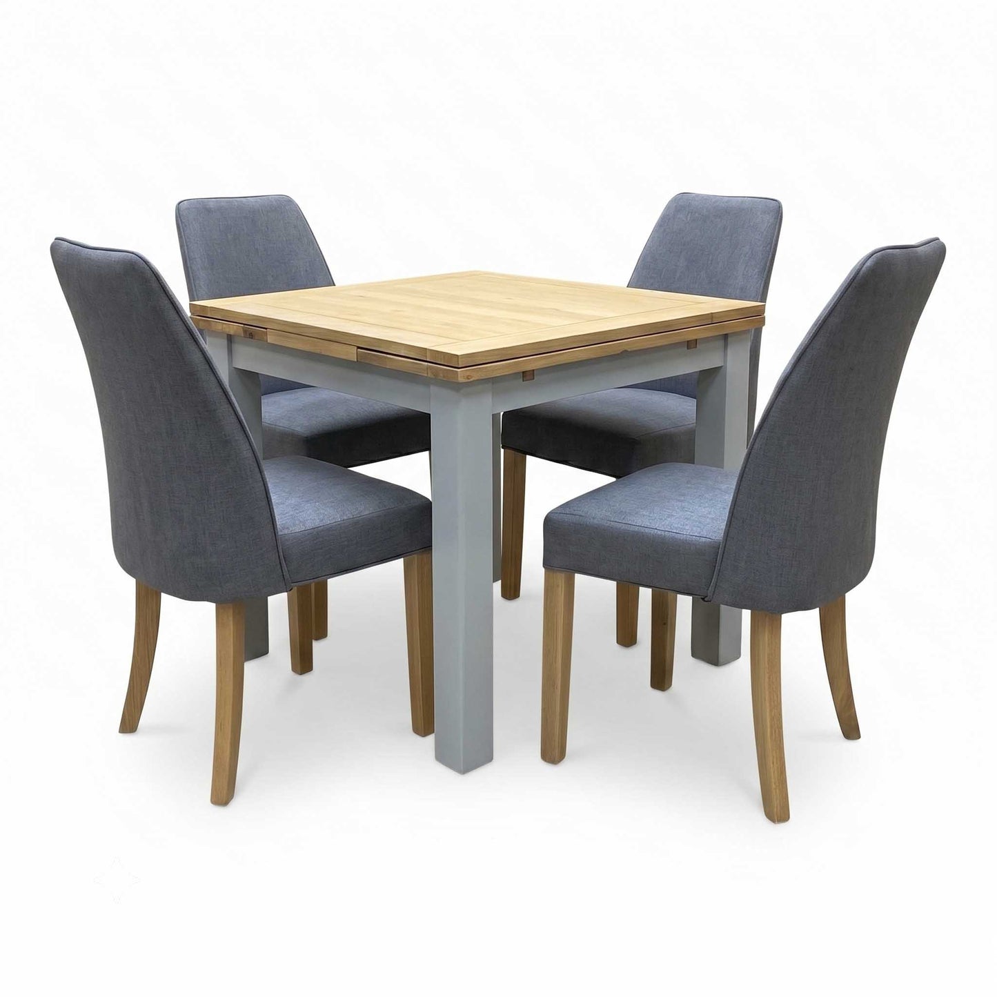 ‘Hamilton’ Solid American Oak Draw Leaf Extending Dining Table with Charcoal Grey Fabric Dining Chairs - Set of 4 Furniture Village