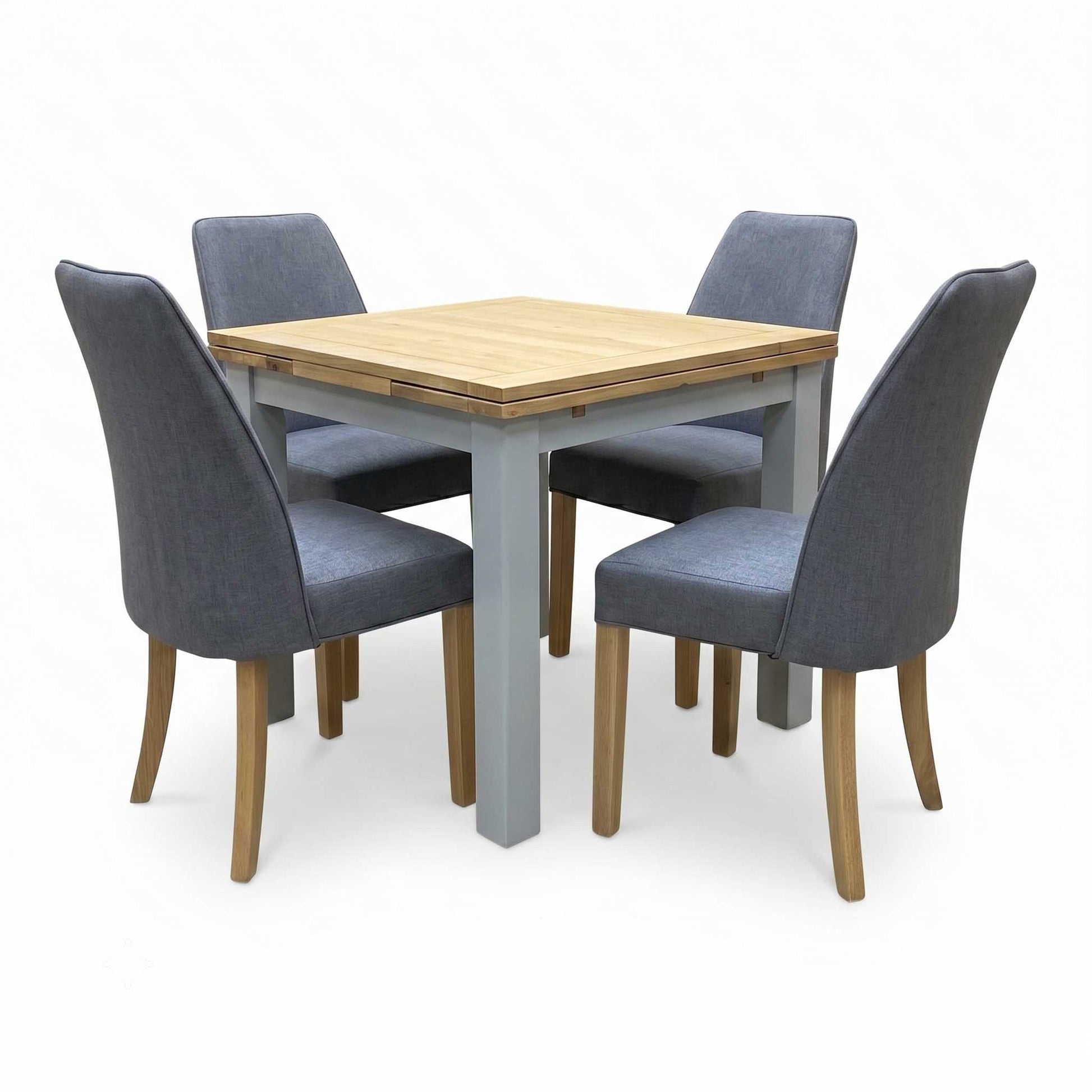 ‘Hamilton’ Solid American Oak Draw Leaf Extending Dining Table with Charcoal Grey Fabric Dining Chairs - Set of 4 Furniture Village