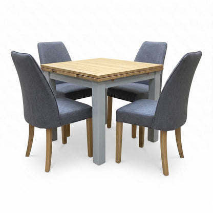 ‘Hamilton’ Solid American Oak Draw Leaf Extending Dining Table with Charcoal Grey Fabric Dining Chairs - Set of 4 Furniture Village