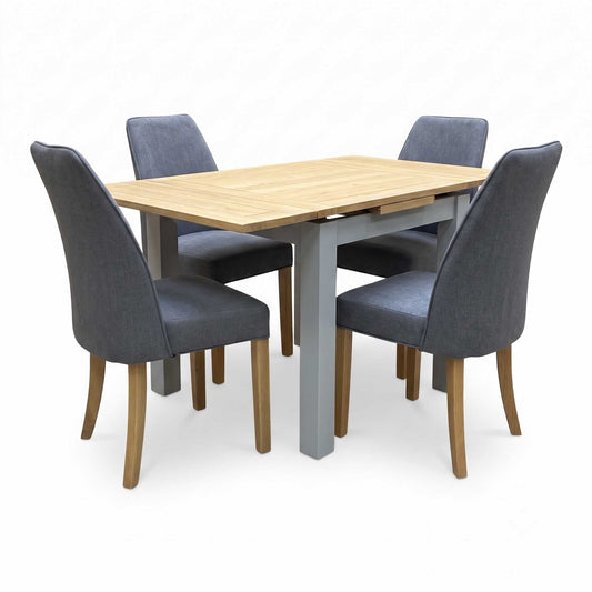 ‘Hamilton’ Solid American Oak Draw Leaf Extending Dining Table with Charcoal Grey Fabric Dining Chairs - Set of 4 Furniture Village