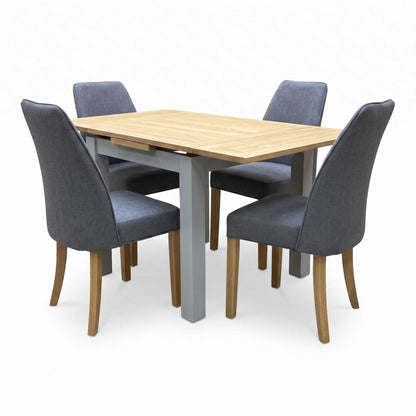 ‘Hamilton’ Solid American Oak Draw Leaf Extending Dining Table with Charcoal Grey Fabric Dining Chairs - Set of 4 Furniture Village