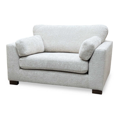 ‘Essie’ Cream Woven Fabric Snuggler Chair DFS