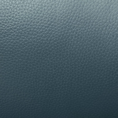 Close-up of the peacock green grained leather used on the Raven sofa and power chair