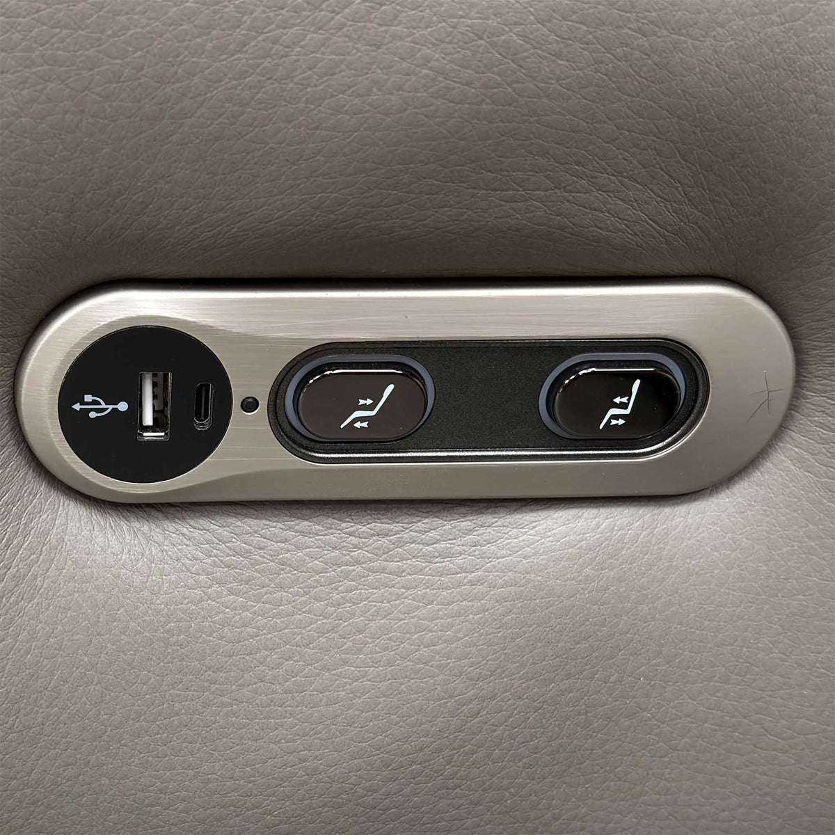 Close-up of the Ankara sofa power recline control panel with USB and USB-C ports and two buttons