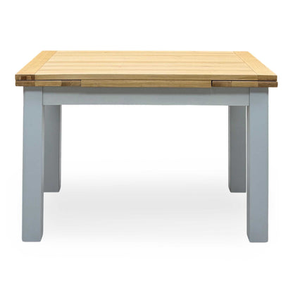 ‘Lewis’ Solid Oak 120cm Large Draw Leaf Extending Dining Table with Dark Grey Faux Leather Roll Back Dining Chairs – view 5