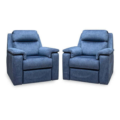 Angled view of the pair of G Plan Thornbury indigo velvet chairs from the set, both upright