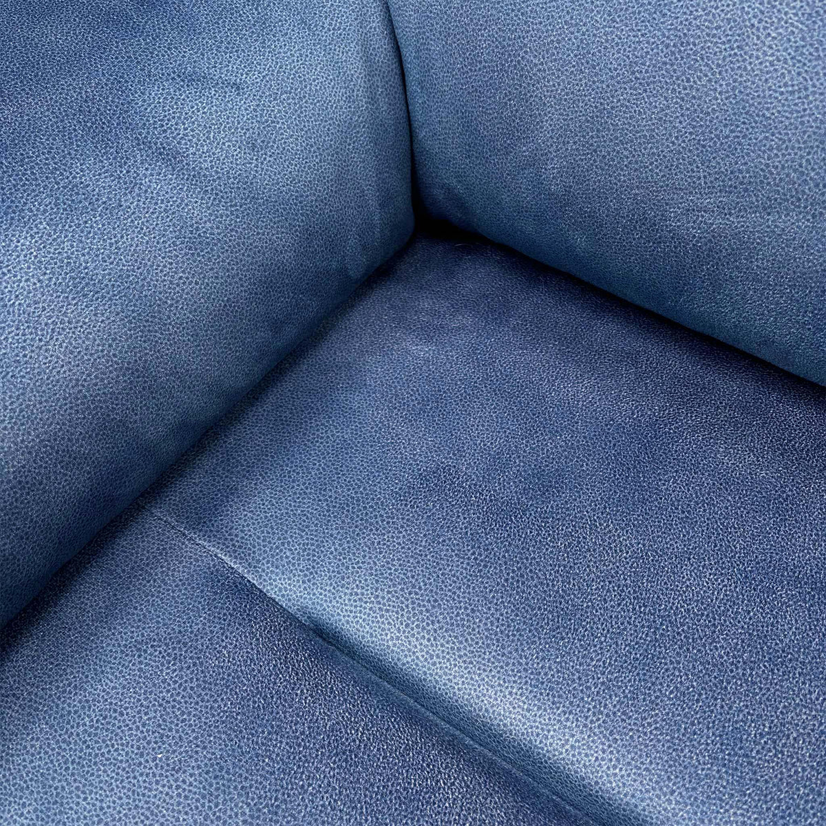 Close-up of the indigo velvet fabric used on the G Plan Thornbury recliner chair set