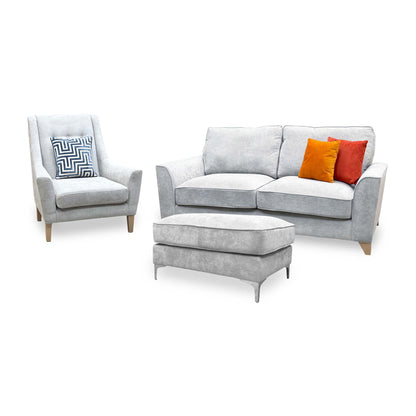 Legend Kingston silver fabric set with the accent chair on the left and footstool in front of the 3 seater sofa