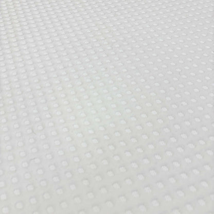 Close-up of the white textured top cover fabric on the Simba Ultra Hybrid 7300 mattress