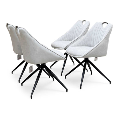 ‘Jai’ Silver Fabric Set of 4 Swivel Dining Chairs