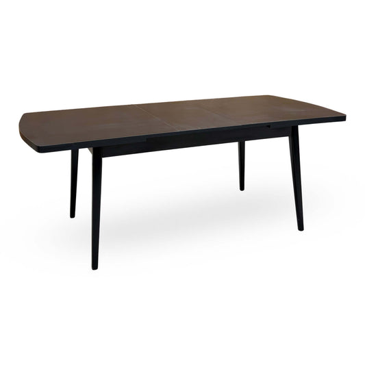 Magda black solid oak large extending dining table fully extended with the centre leaf in place, angled view