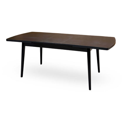 Magda black oak extending dining table extended, angled view from the right showing the three-part top