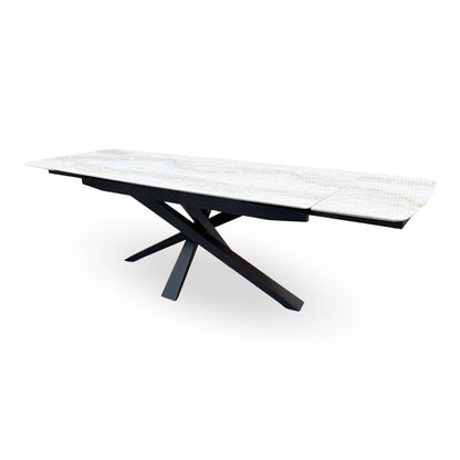 Germain real marble top extending dining table fully extended, angled view from the right end