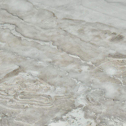 Close-up of the grey-veined white real marble top on the Germain extending dining table