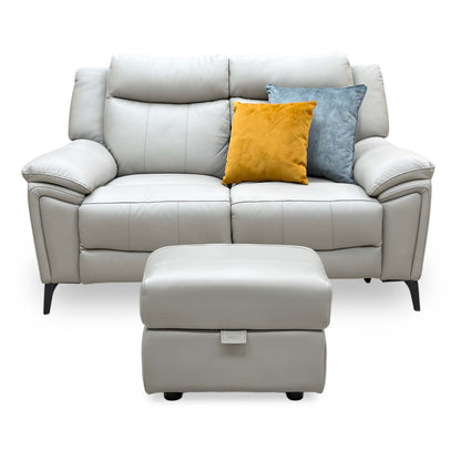 Front view of the Panache lead grey leather 2 seater power recliner sofa with the footstool in front