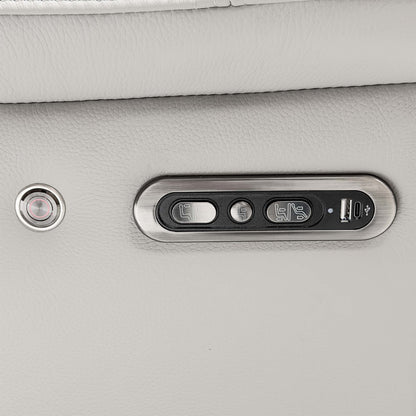 Close-up of the Panache sofa power recline controls with headrest buttons and a USB port on the leather arm