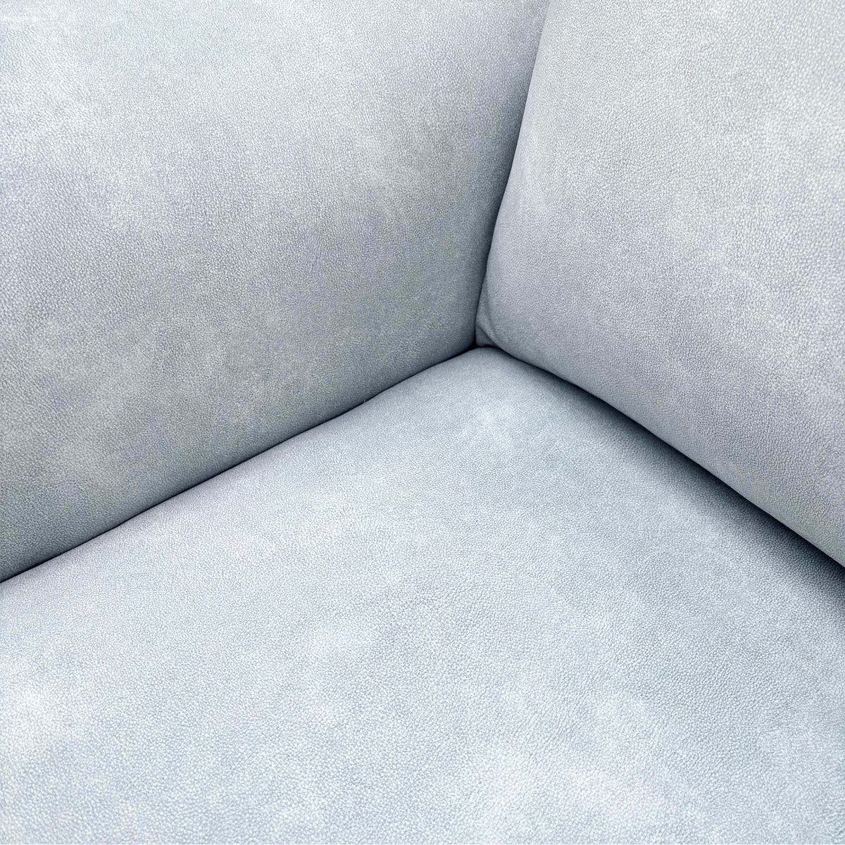 Close-up of the smoke grey velvet fabric used on the Morgan Dexter power recliner sofa and armchair