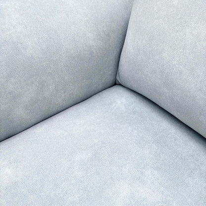 Close-up of the smoke grey velvet fabric used on the Morgan Dexter power recliner sofa and armchair