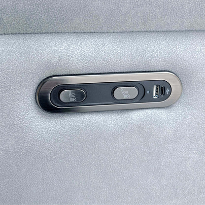 Close-up of the Morgan smoke grey sofa power recline buttons with USB-A and USB-C charging ports