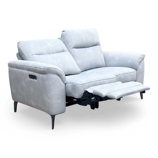 Morgan smoke grey velvet 2 seater power recliner sofa, angled view with the right footrest extended