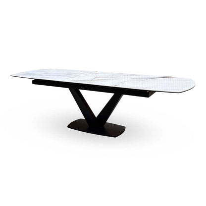 Jose white marble effect ceramic table extended to 260cm with the centre leaf raised, angled from the other end