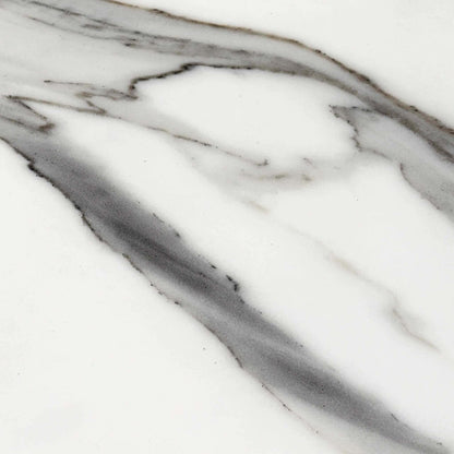 Close-up of the white Fiorentino marble effect ceramic used on the Jose dining table top