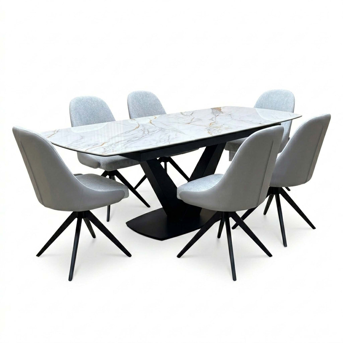Jose white marble effect extending table and six stone grey faux leather swivel chairs with black splayed legs