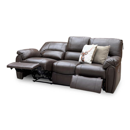 Side angle of the Leighton chocolate brown leather sofa with the left seat fully reclined and right footrest up