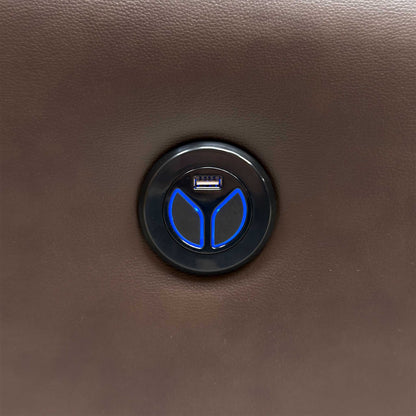 Close-up of the blue-lit power recline button with USB charging port on the Leighton brown leather sofa