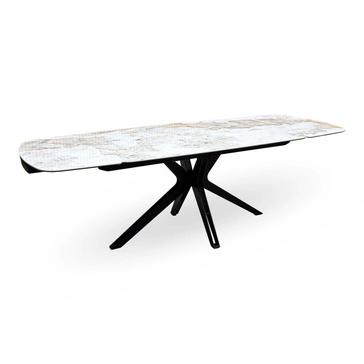 Jose Calcatta marble extending dining table with both leaves extended, angled view showing the black star base