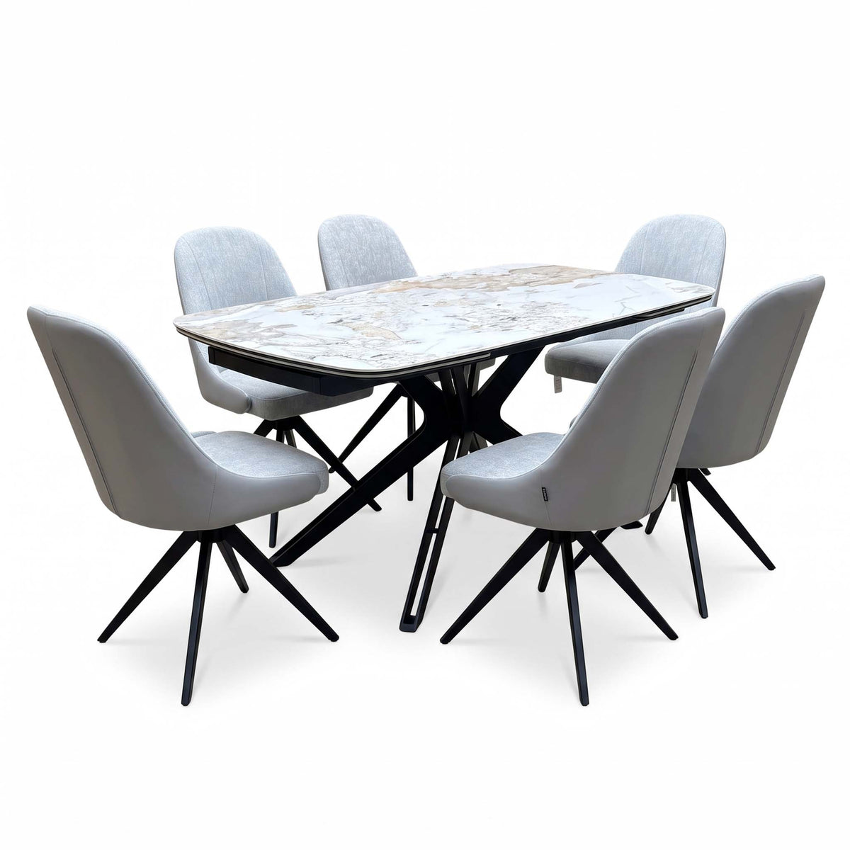 Jose Calcatta marble 160cm dining table set, closed, angled view from the left with six stone grey swivel chairs