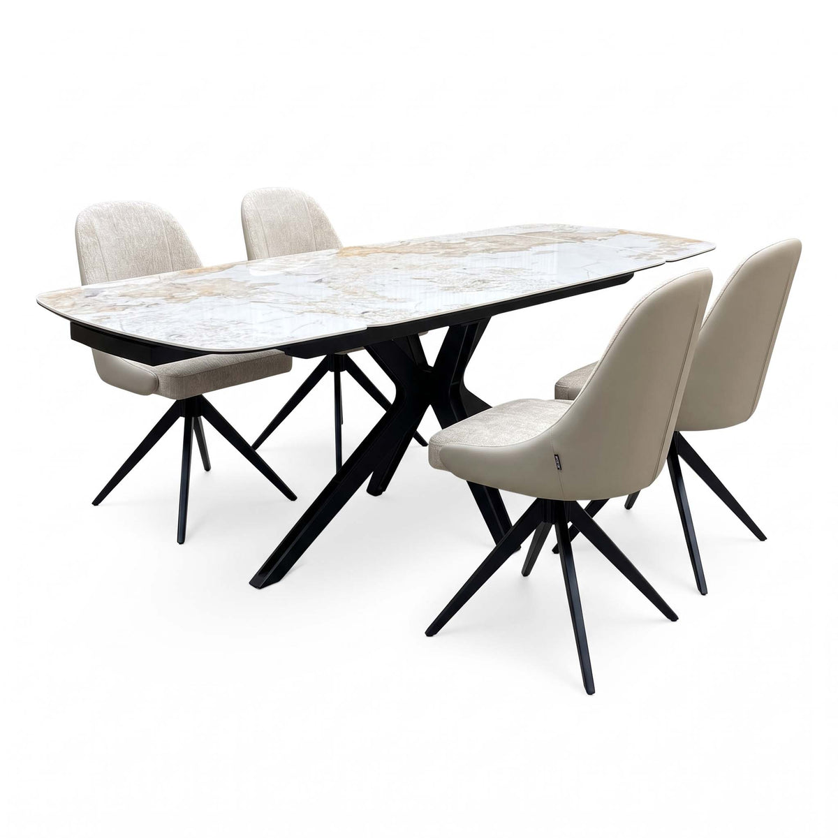 Jose Calcatta marble 160cm extending dining table with 4 beige fabric swivel chairs, angled view from the right