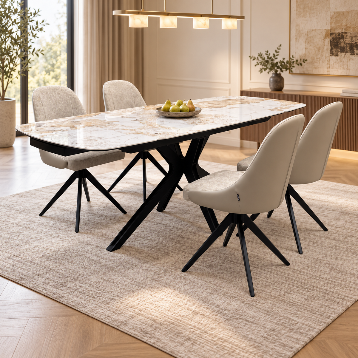 Jose Calcatta marble 160cm dining table and 4 beige swivel chairs in a dining room with a bowl of pears on top