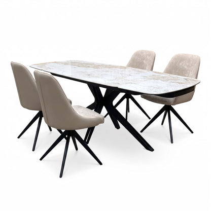 Side-on view of the Jose Calcatta marble dining set with the two arm chairs behind the table