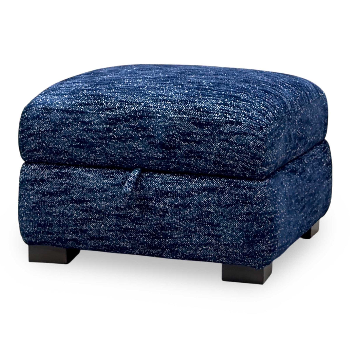 Nova dark denim blue woven fabric storage footstool, angled from the left showing the lid pull tab