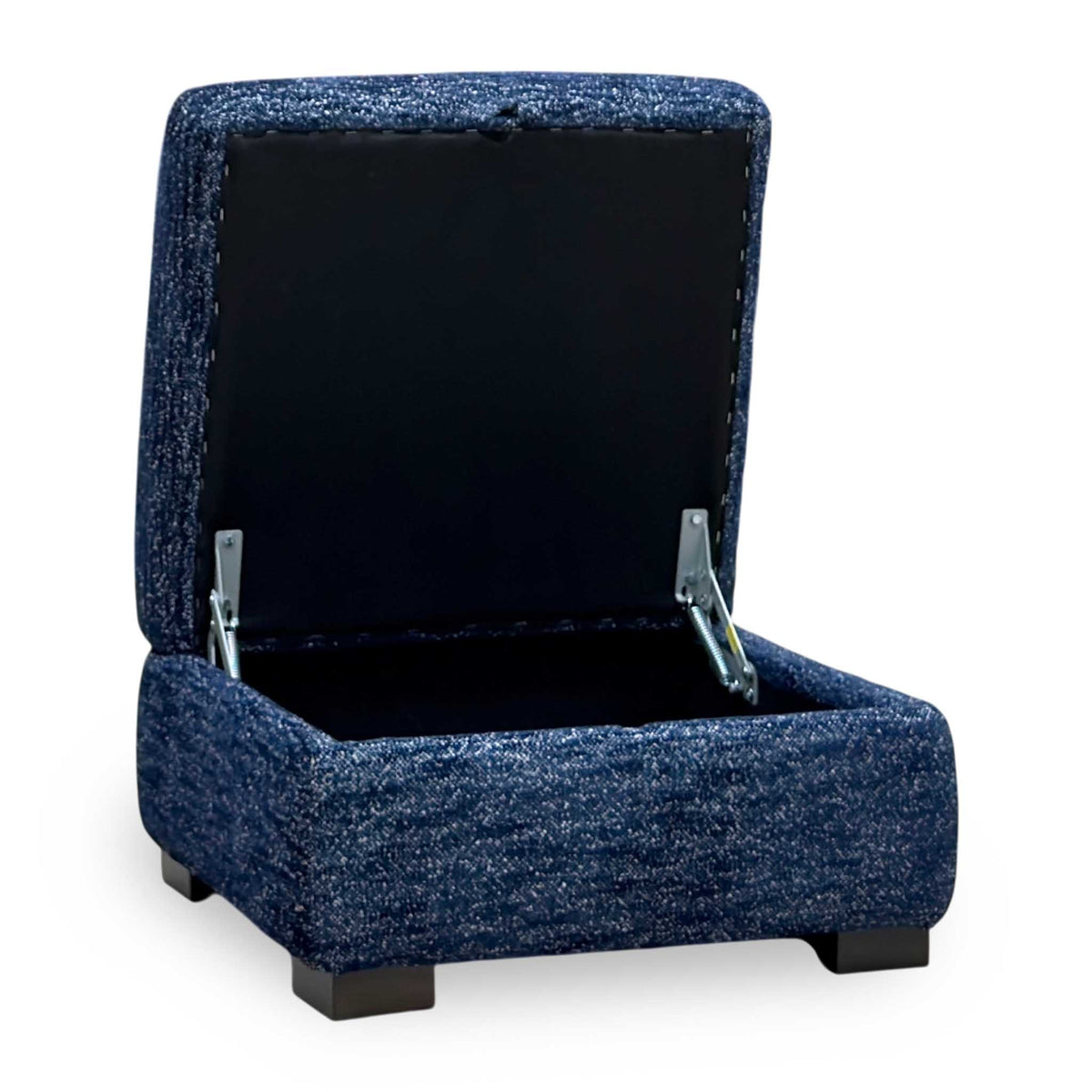 Nova dark denim blue storage footstool with the lid open, angled from the left to show the storage space