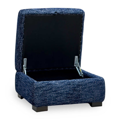 Nova dark denim blue storage footstool with the lid open, angled from the left to show the storage space