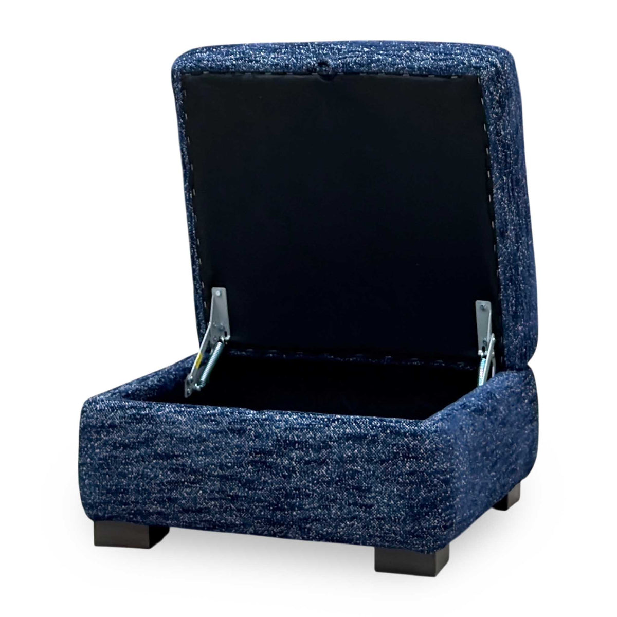 Nova dark denim blue storage footstool with the lid open, angled from the right showing the lid stays