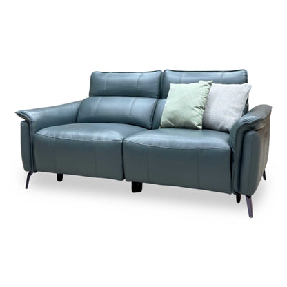Side angle of the Jude Oslo peacock green leather sofa showing the flared arms upright