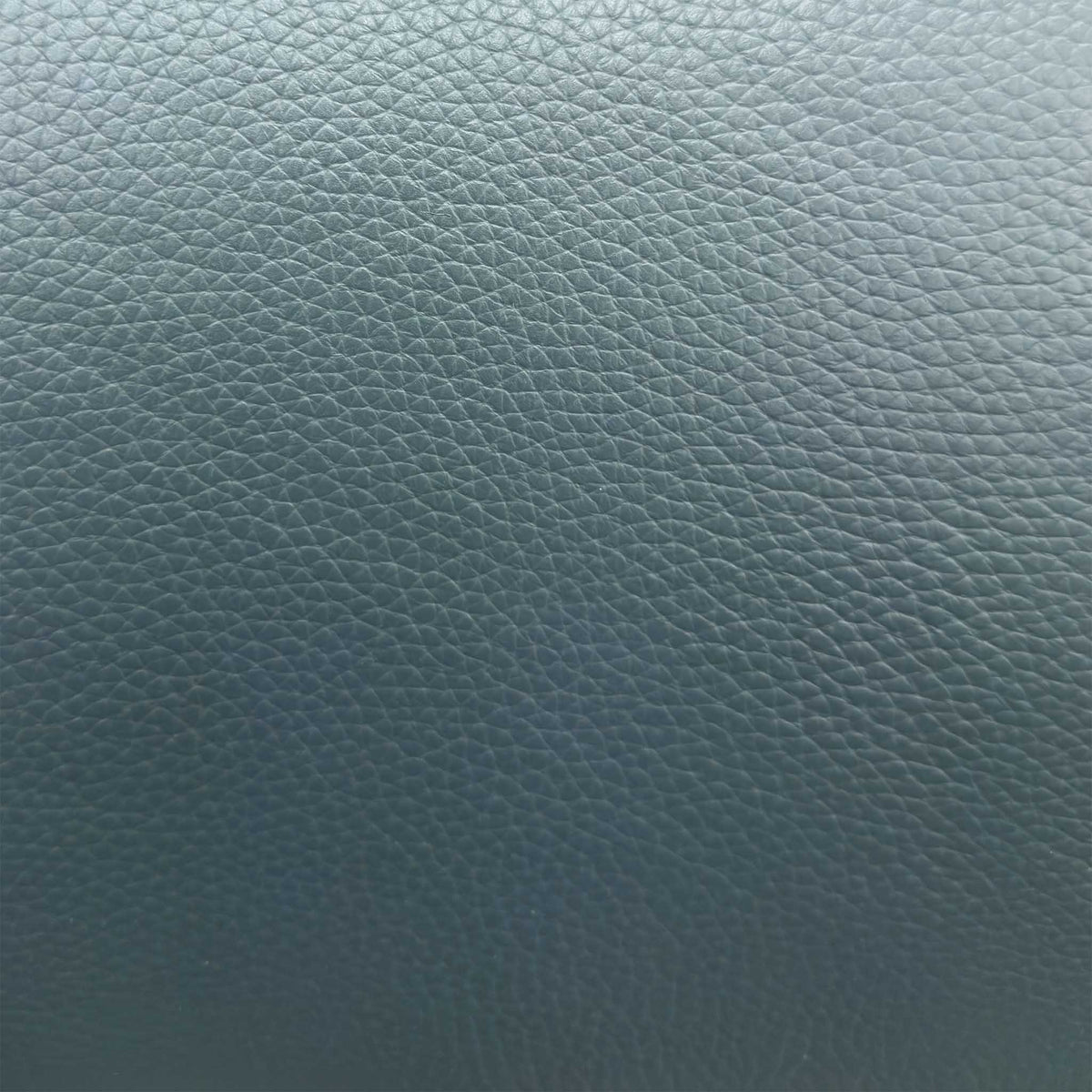 Close-up of the peacock green grained Oslo leather used on the Jude sofa
