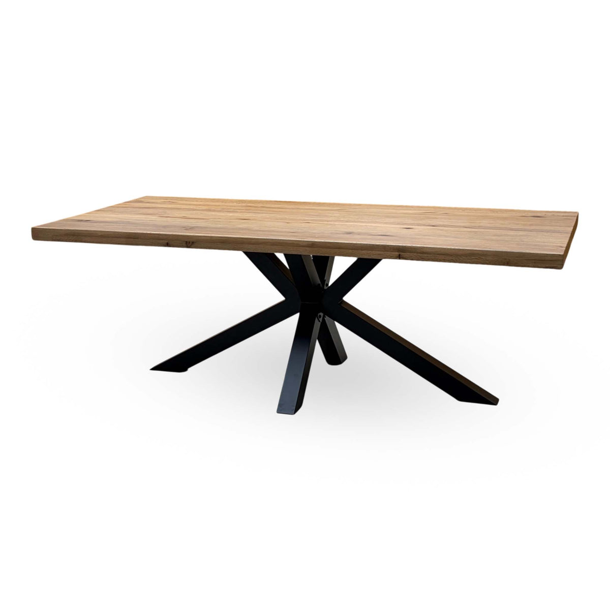 Bodahl Njord solid oak dining table, angled from the other end showing the metal star base