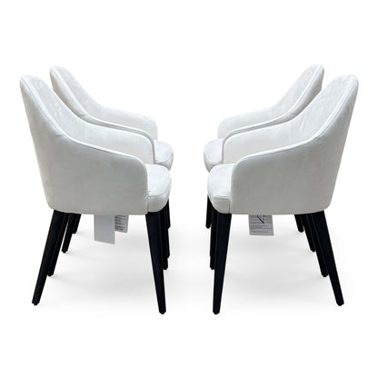 Side view of the Blade set of 4 white suede fabric dining chairs in two facing pairs