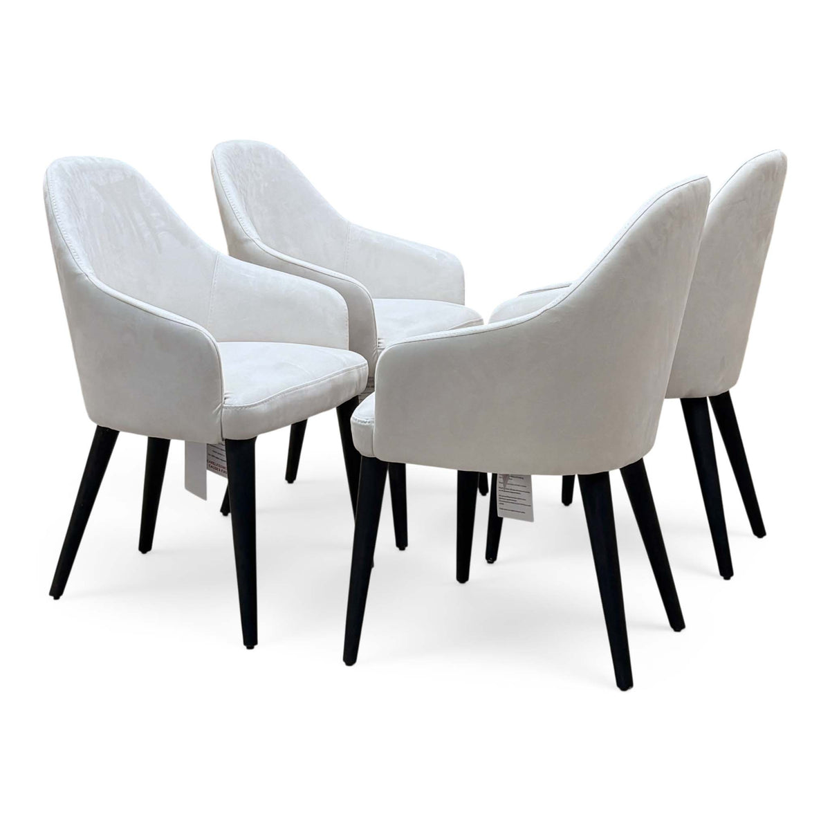 Blade set of 4 white suede fabric dining chairs, angled view showing curved backs and black legs