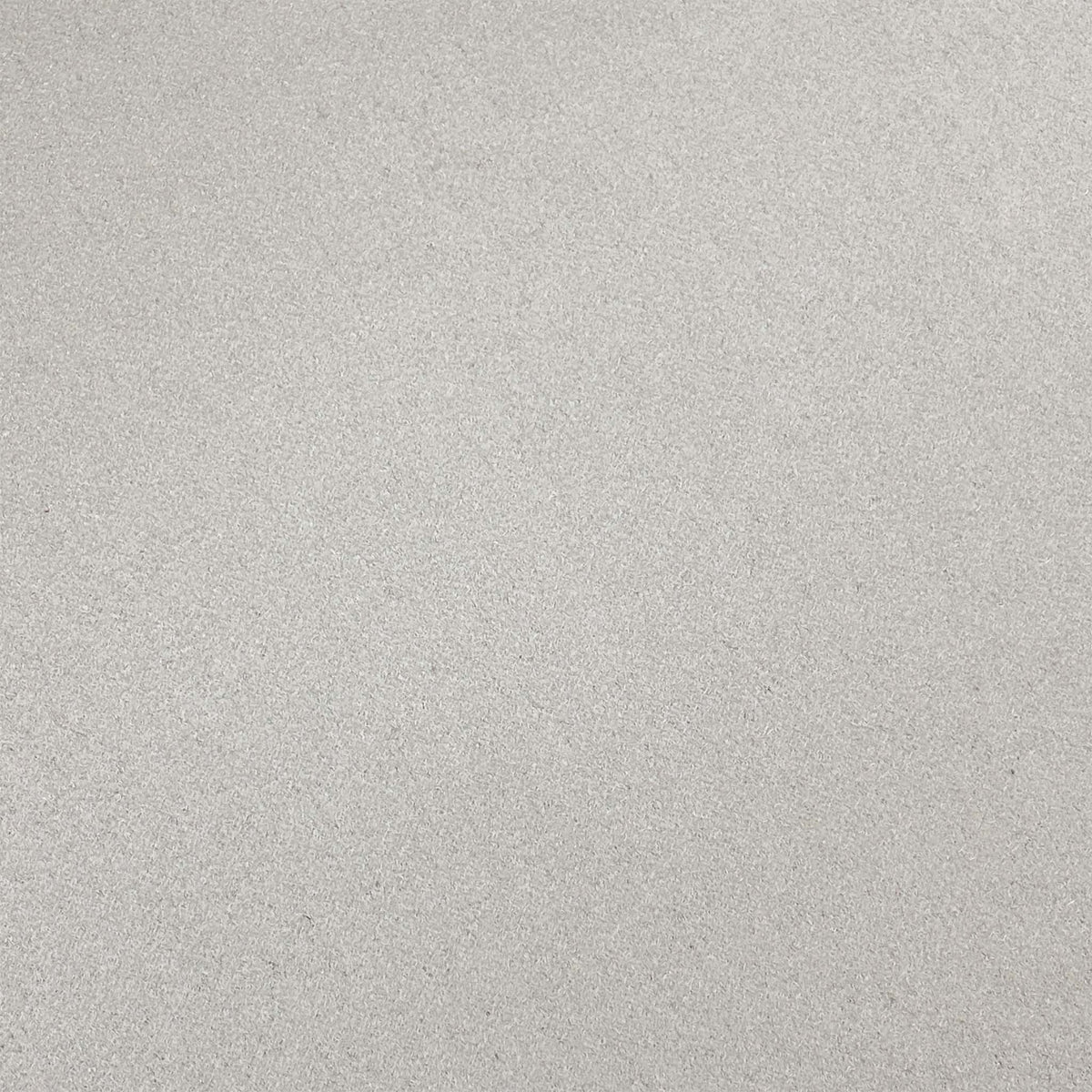 Close-up of the white suede fabric used on the Blade dining chairs