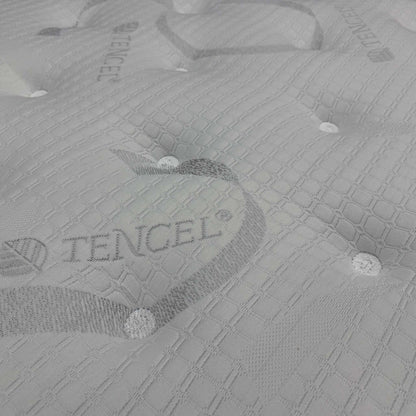 Close-up of the tufted Tencel-branded quilted cover on the Bliss 1500 pocket orthopedic mattress