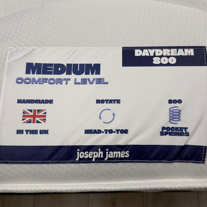 Daydream 800 mattress label showing medium comfort level, handmade in the UK, rotate head-to-toe, 800 pocket springs