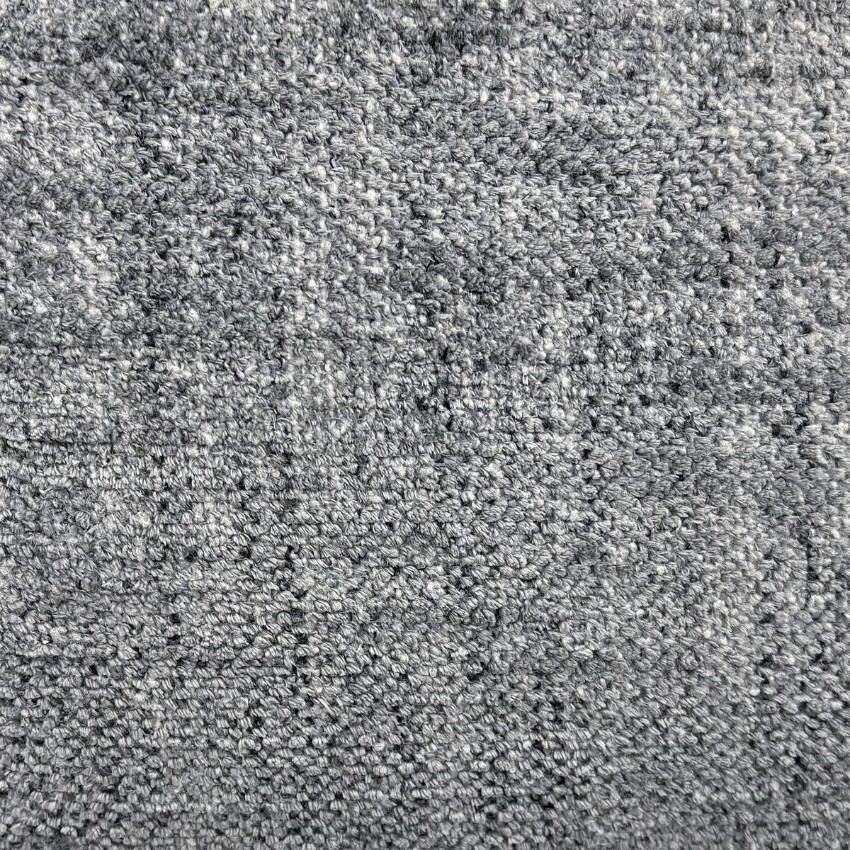 Close-up of the dove grey woven fabric used on the Hollywood power recliner media sofa