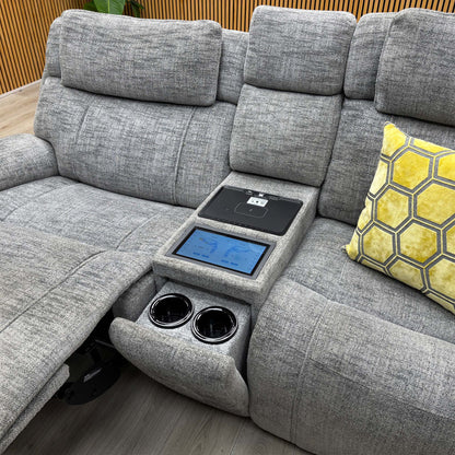 Hollywood dove grey fabric media sofa centre console open showing the touchscreen panel and two cup holders