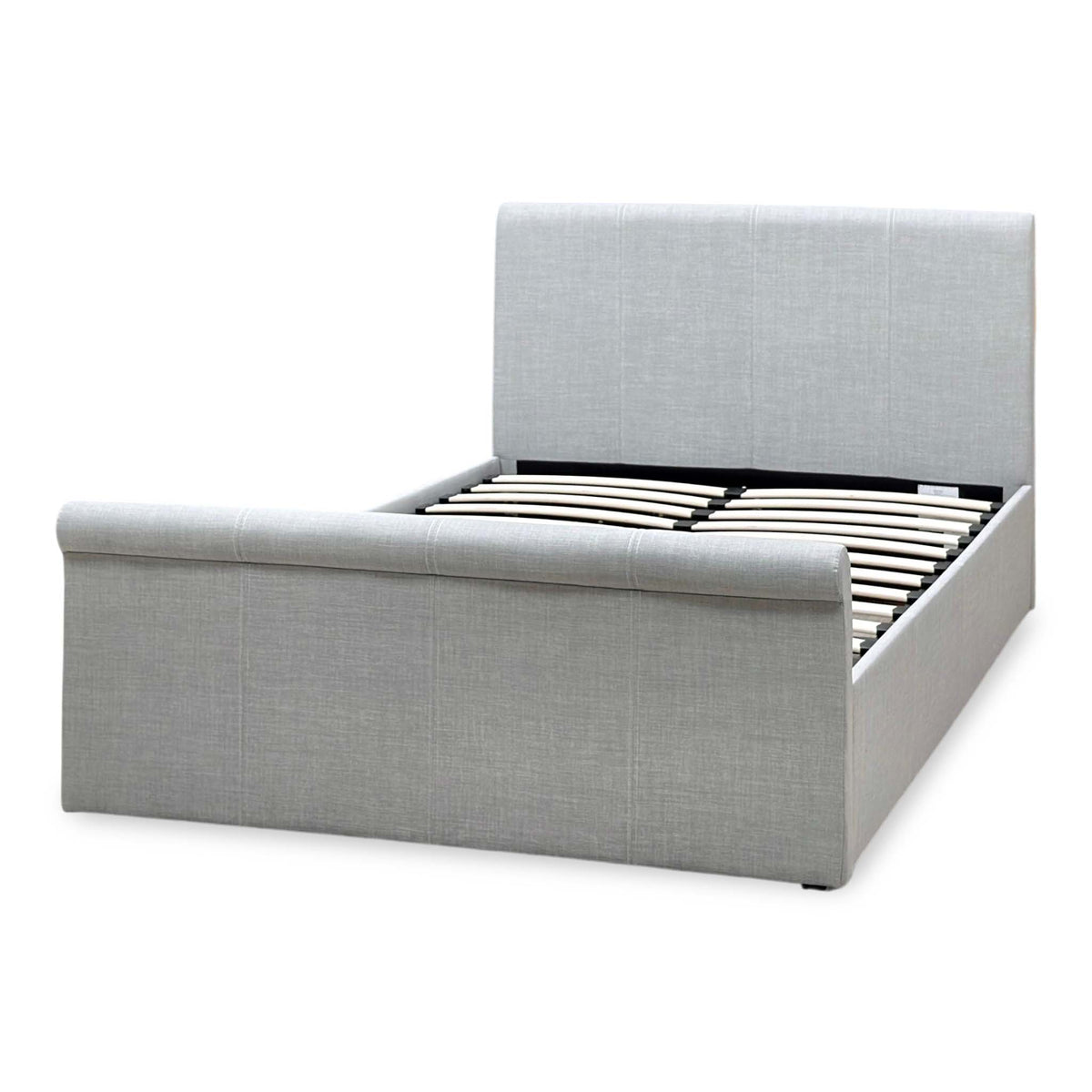 Stanley grey fabric small double ottoman bed, angled view from the right showing the slats and scroll foot end