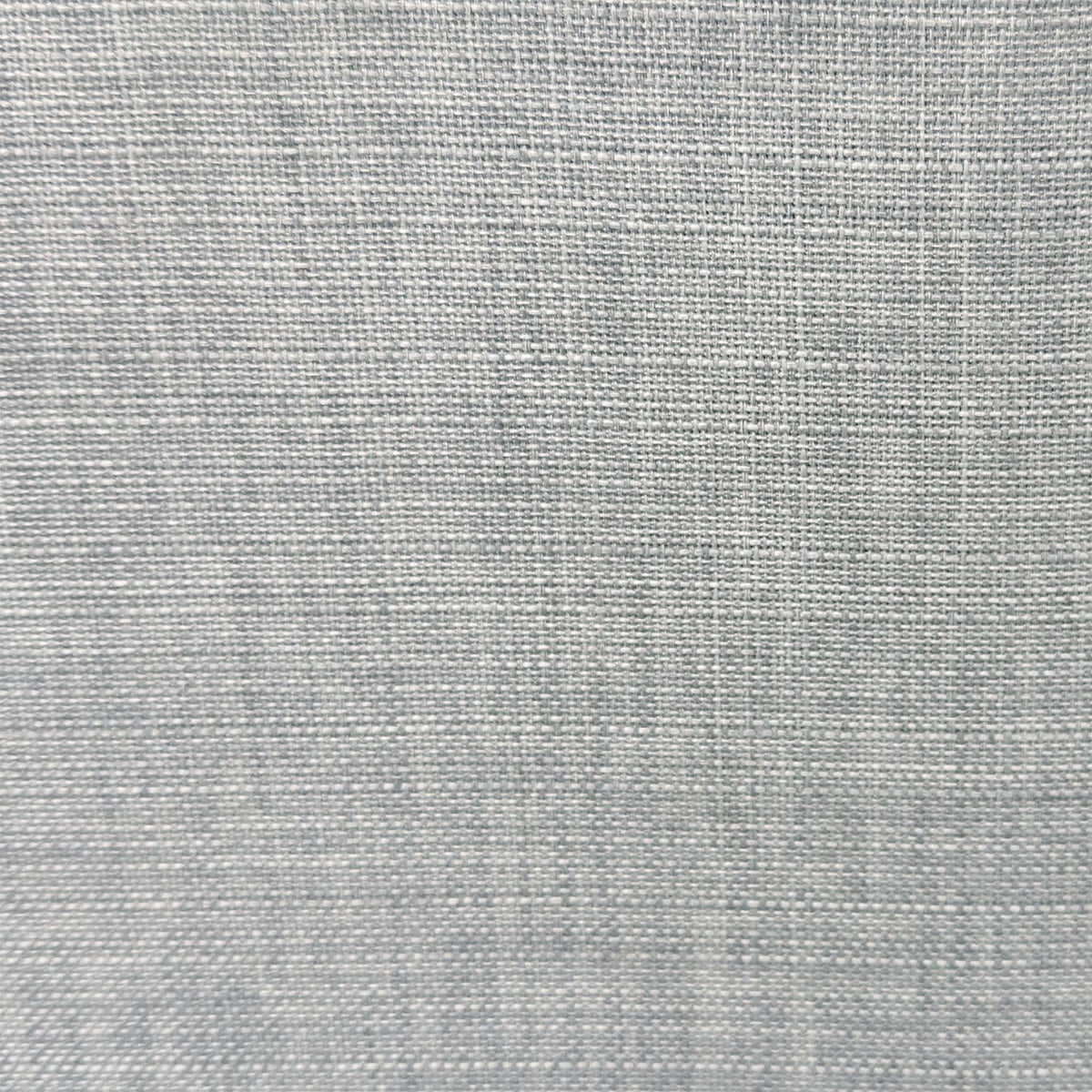 Close-up of the grey woven fabric used on the Stanley ottoman bed